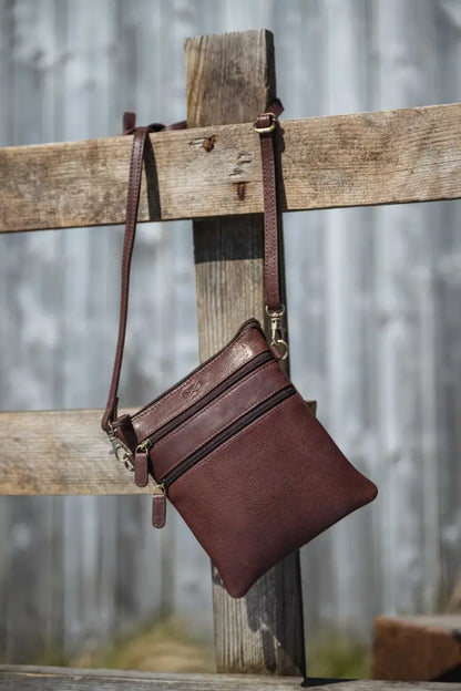 Brown Hoggs of Fife Monarch Leather Travel Organiser with multiple pockets and adjustable strap