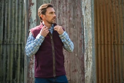 Hoggs of Fife Stenton Technical Fleece Gilet with Burgundy fleece vest and plaid shirt