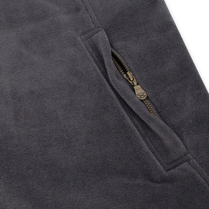 Charcoal gray technical fleece fabric with partially unzipped pocket on Hoggs of Fife Stenton Gilet for country clothing and hunting