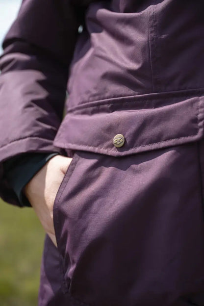 Lavender waterproof long coat with button closure and belt detail from Hoggs of Fife