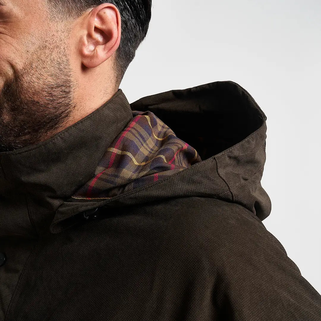 Dark olive Jack Pyke Ashcombe hooded jacket with burgundy plaid lining