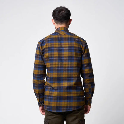 Man in Jack Pyke Bleasdale heavy flannel shirt with mustard yellow navy plaid