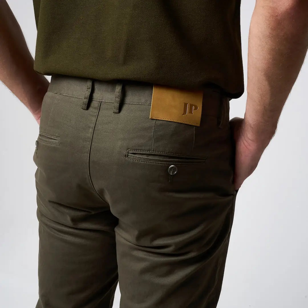 Olive green Jack Pyke Chino trousers with tan leather patch