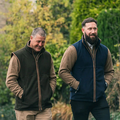 Two men in Jack Pyke 300gsm micro fleece gilets, perfect for outdoor adventures
