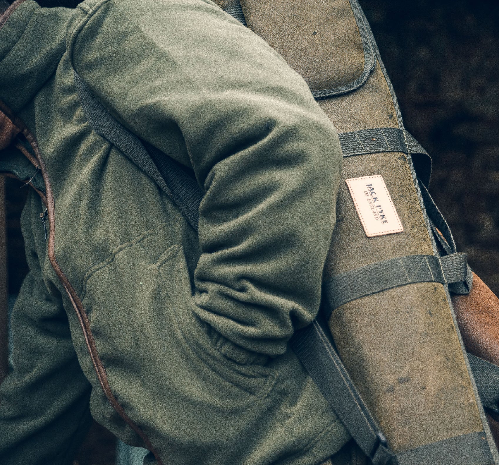 Olive green gun case featured with Jack Pyke Countryman Fleece Jacket