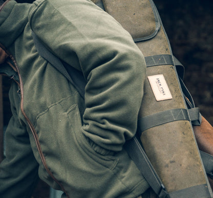 Olive green gun case featured with Jack Pyke Countryman Fleece Jacket