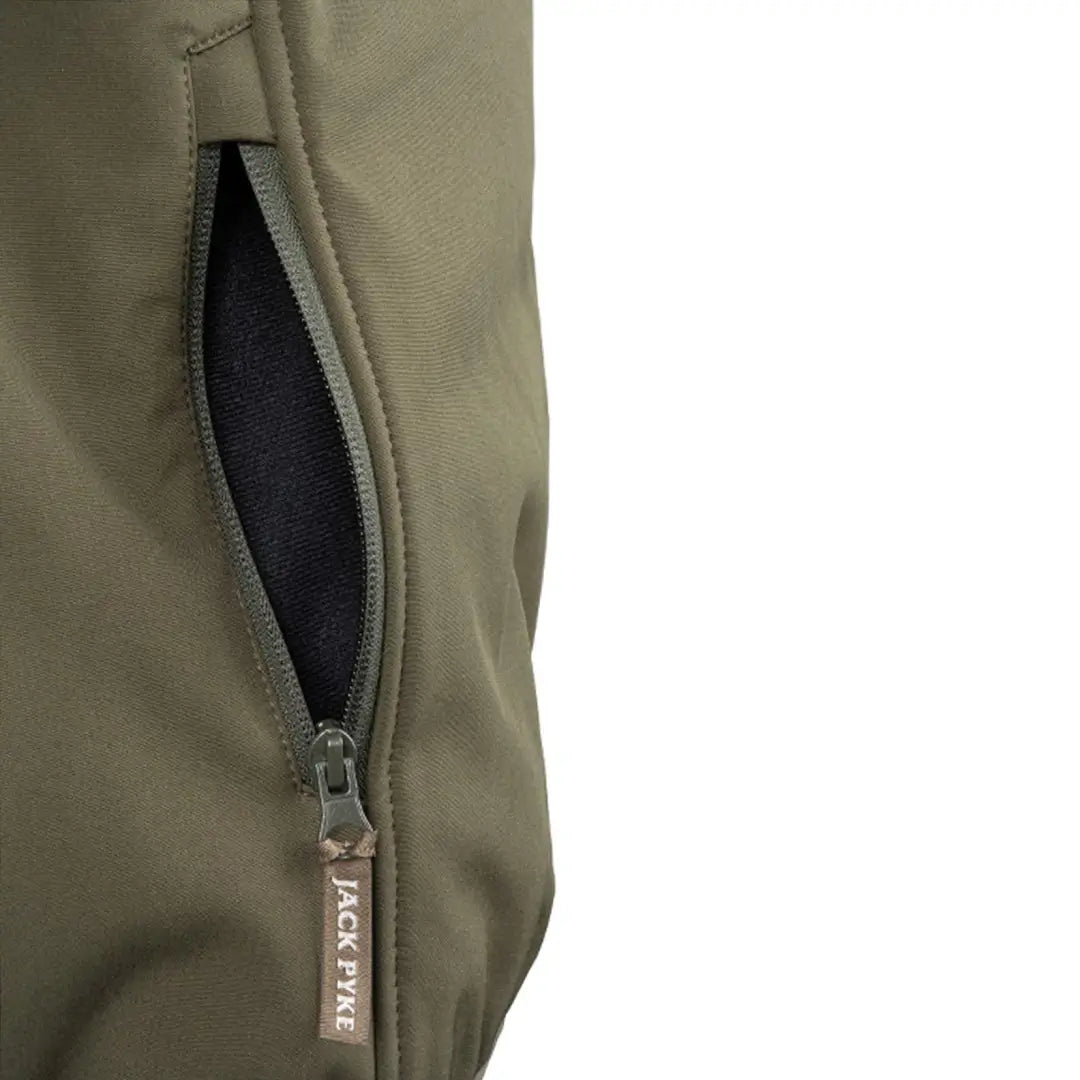 Partially unzipped zipper on Jack Pyke County Softshell Jacket for hunting adventures
