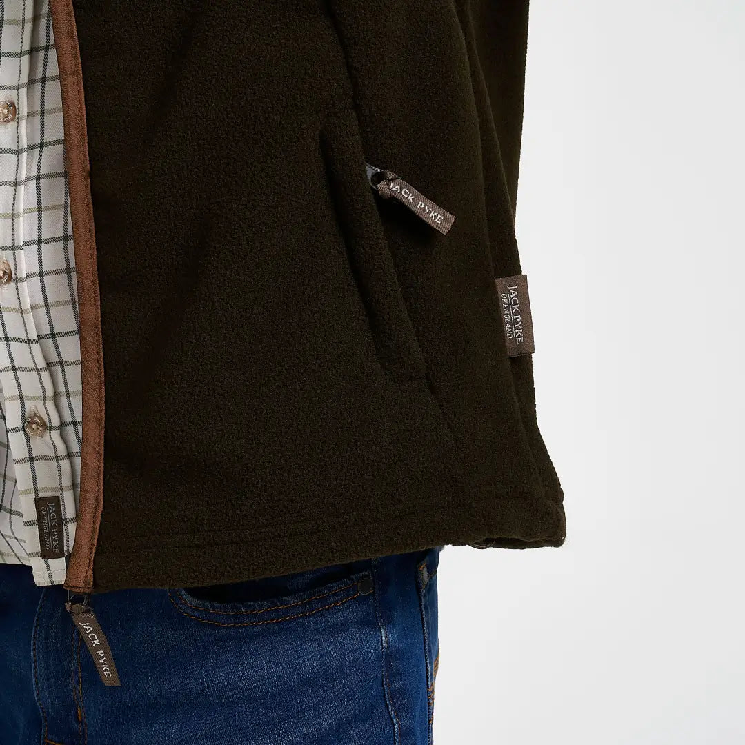 Dark olive green Jack Pyke Junior Countryman fleece gilet with brown leather trim