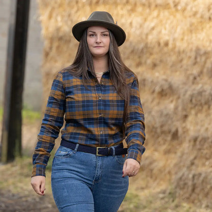 Woman in plaid shirt and hat wearing Jack Pyke Ladies Bleasdale Heavy Flannel Shirt
