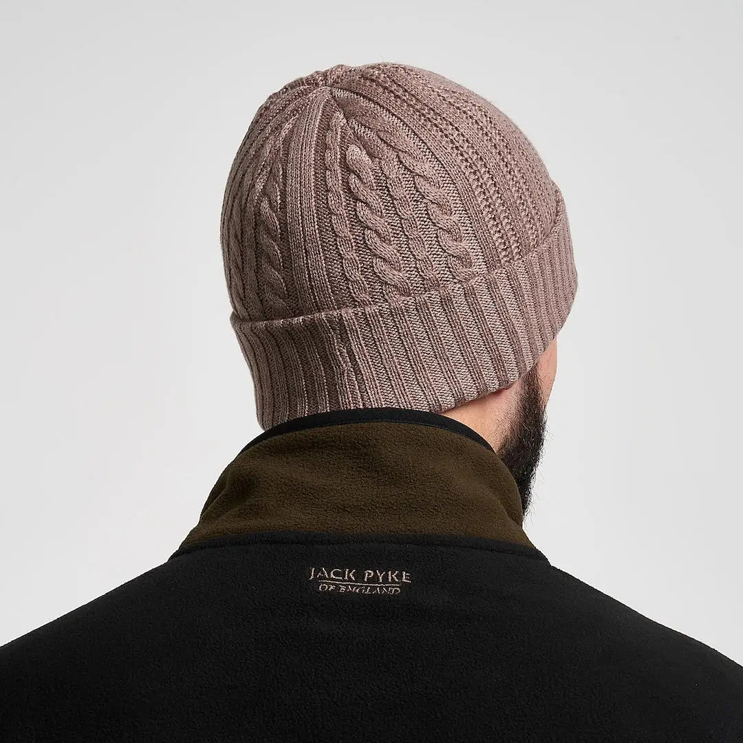 Man wearing Jack Pyke Merino wool beanie in taupe cable-knit style
