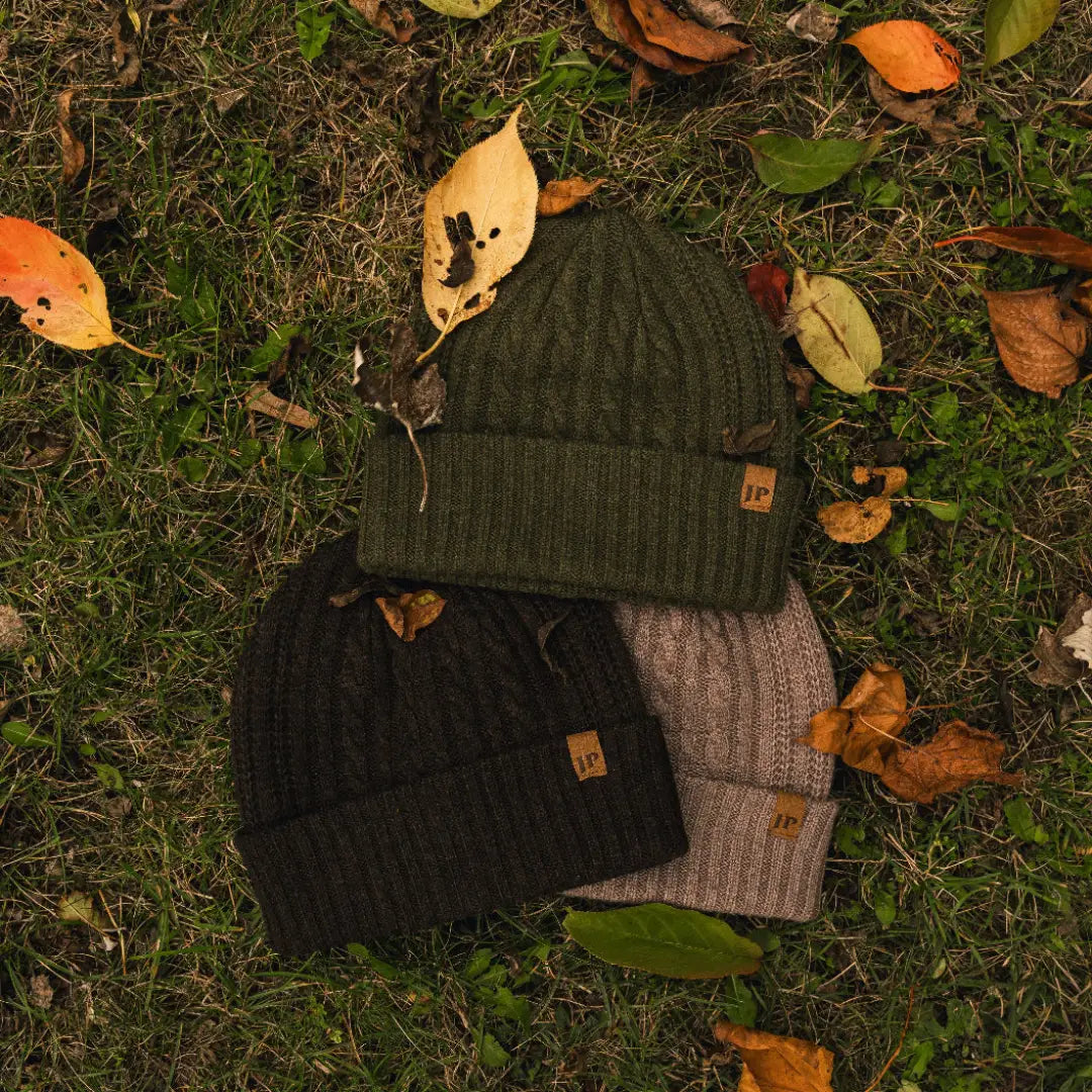 Three cozy Jack Pyke Merino Wool Beanies in stylish colors for winter warmth