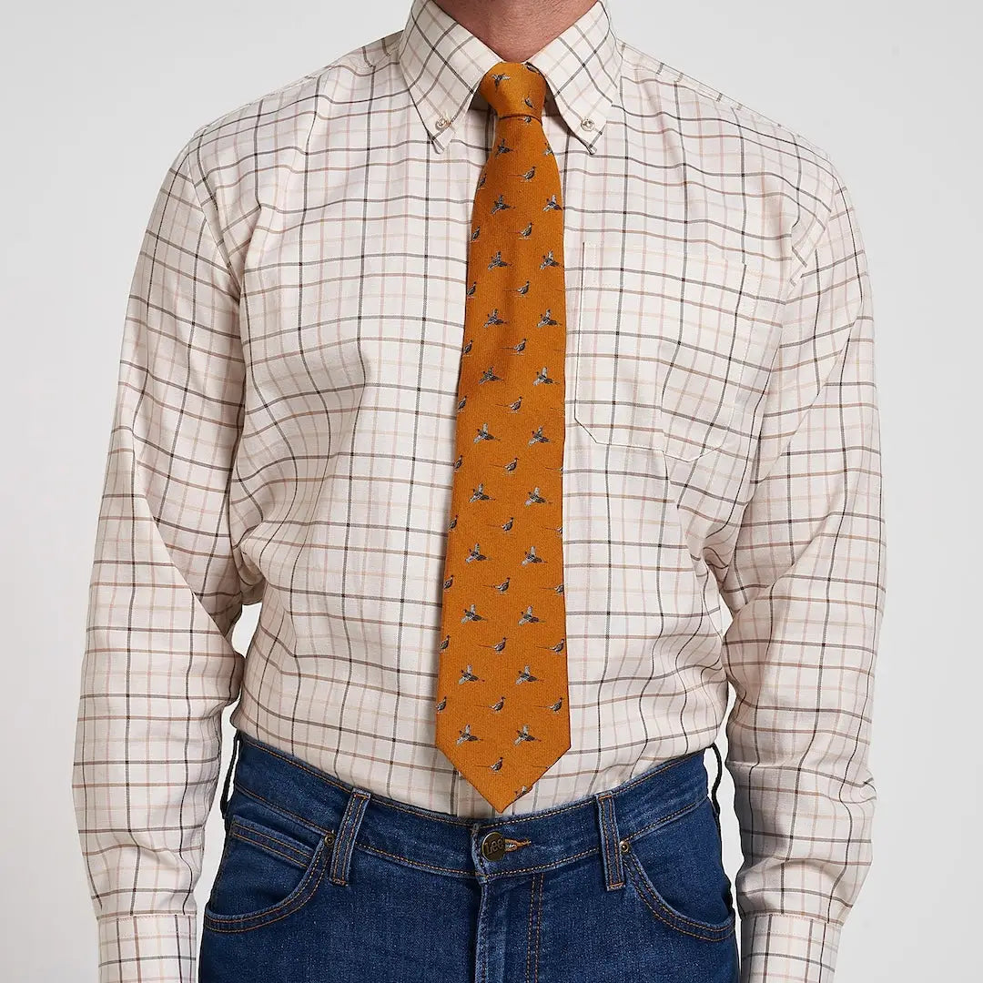 Jack Pyke Pheasant silk tie with bird pattern on plaid shirt