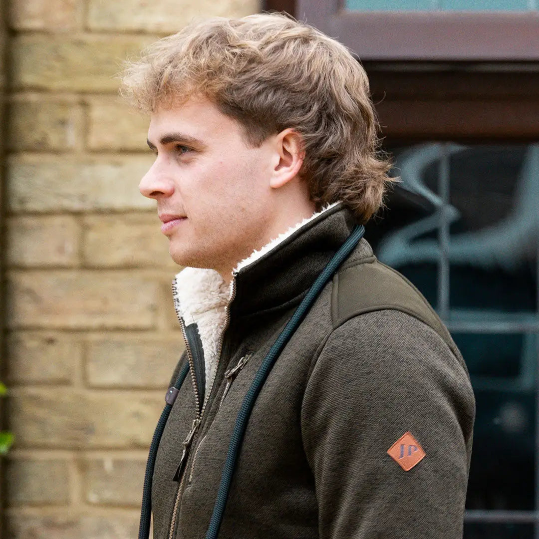 Jack Pyke Scandinavian Fleece Jacket in olive green shearling-lined with red sleeve patch