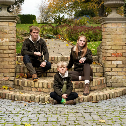 Brown leather hiking boots with green laces in Jack Pyke Scandinavian fleece jacket