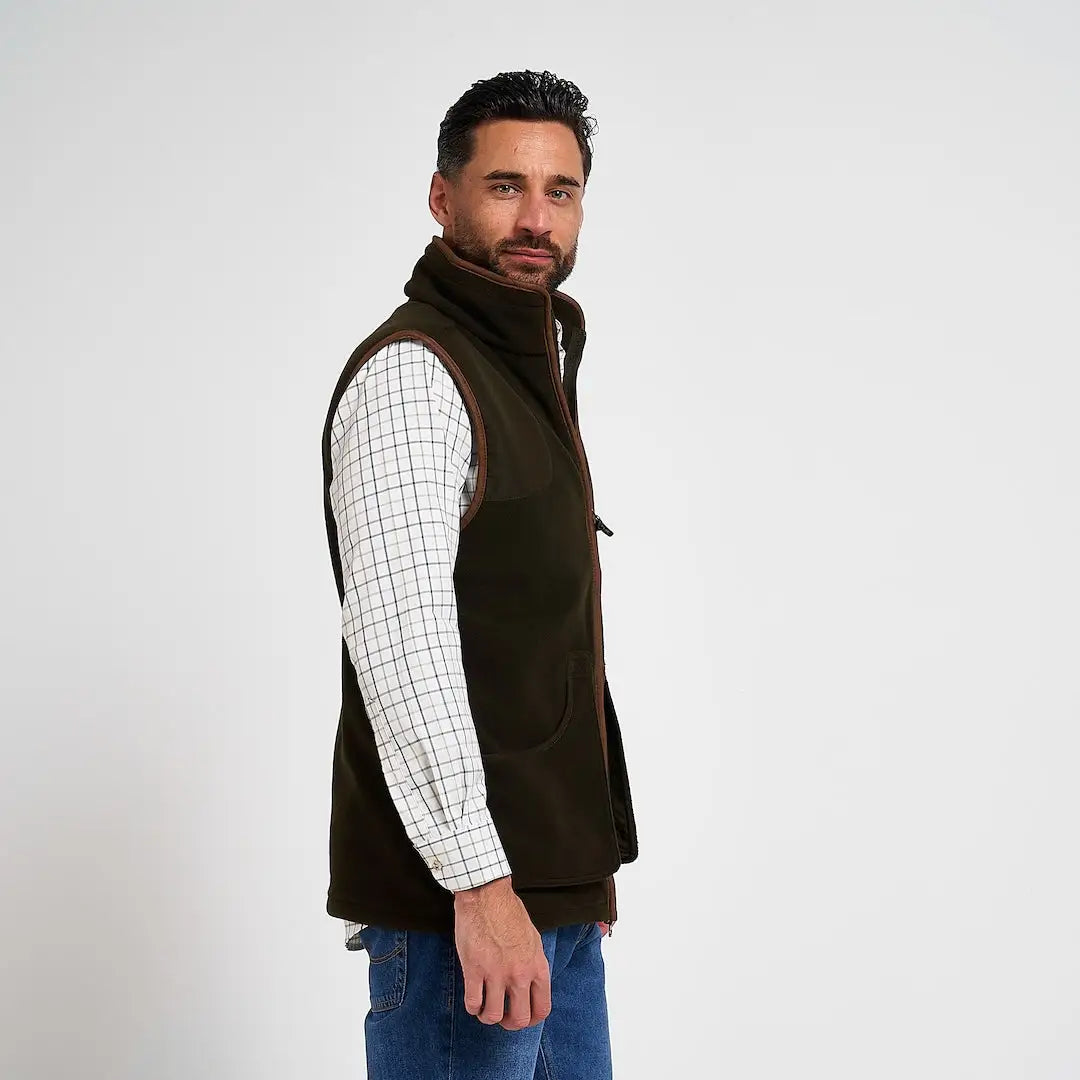 Olive green Jack Pykes shooters gilet with brown trim and high collar