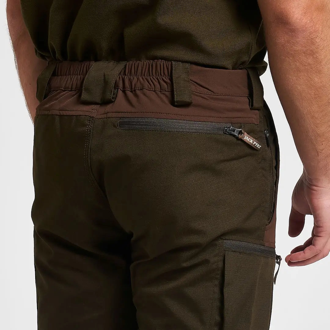 Dark olive Jack Pyke technical hybrid trousers with brown elastic waistband