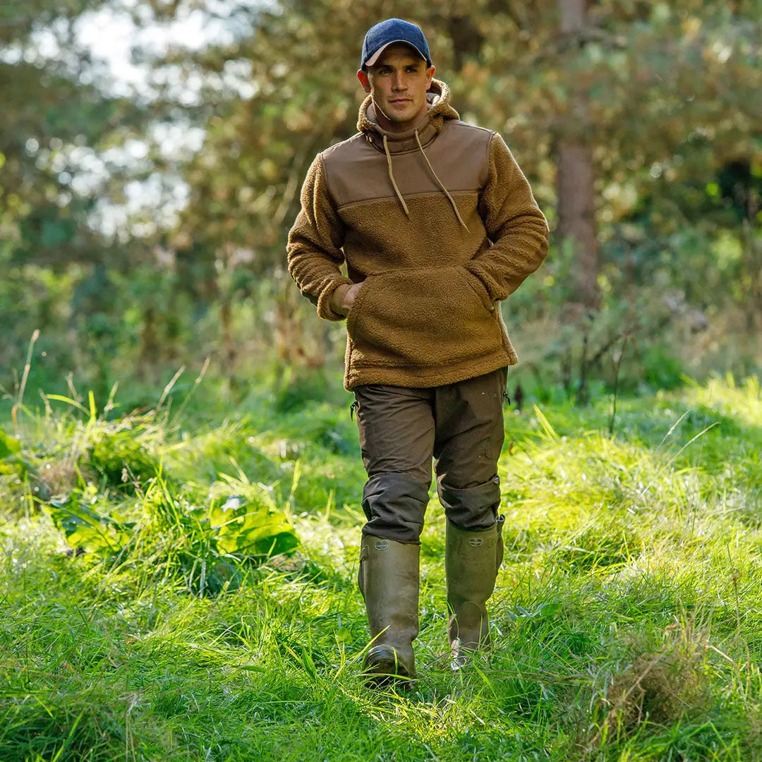 Man in Jack Pyke Weardale Hunting Trousers ready for outdoor adventures