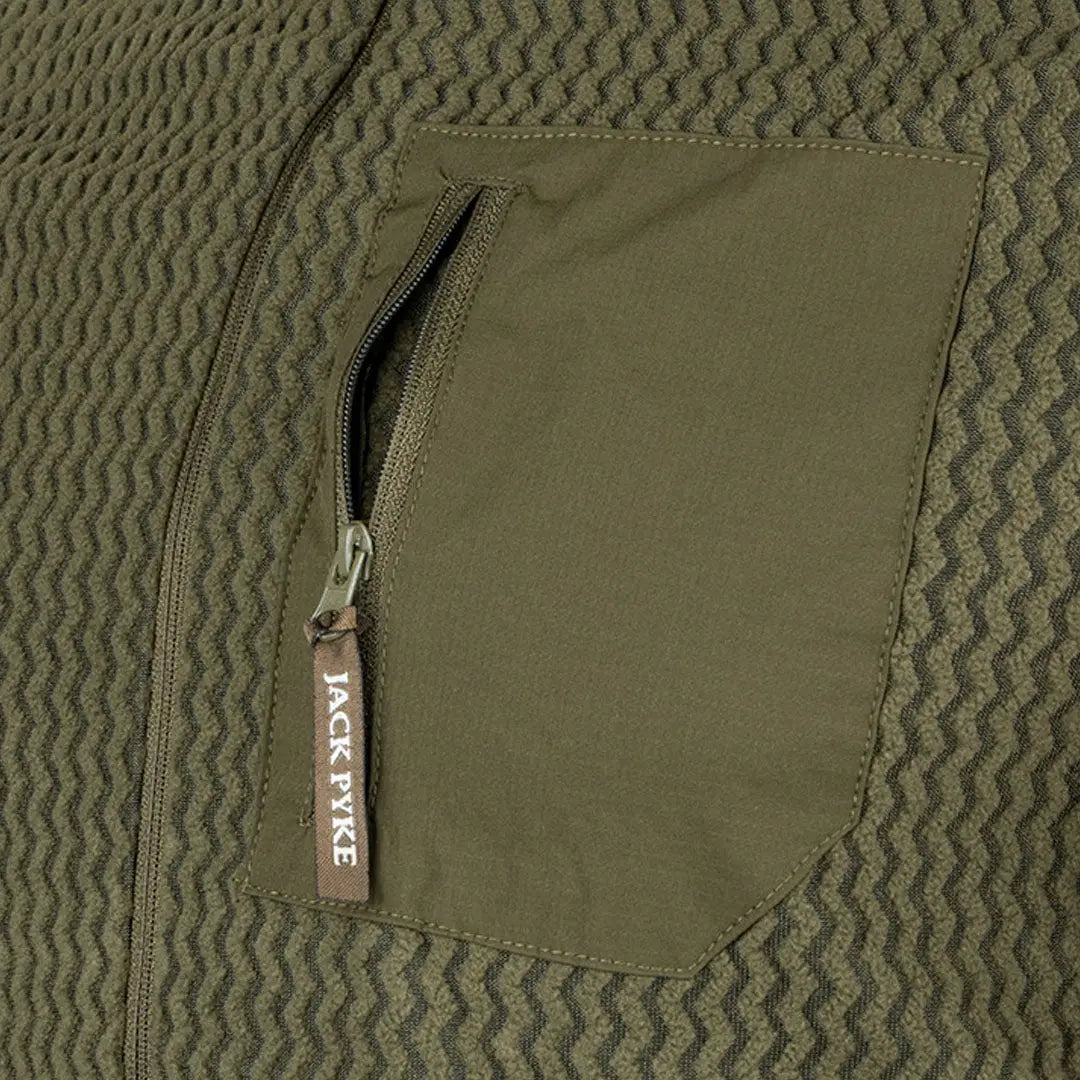 Olive green jacket pocket of the Jack Pyke Z Fleece Pullover for outdoor adventures