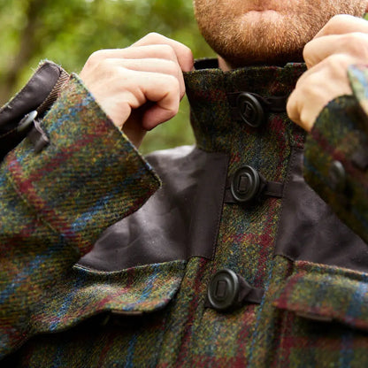 Plaid wool coat with large buttons, showcasing the stylish Keela Harris Tweed Smock