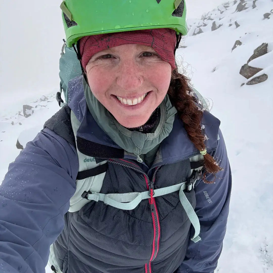 Smiling woman in Keela Womens Solo Primaloft Gilet, perfect country clothing for outdoors hunting
