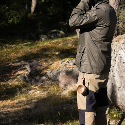 Olive green jacket styled with a Kupilka Classic Cup for country clothing and outdoors fun