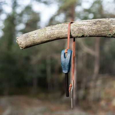 Blue handled fire starter with striker from Kupilka Firesteel for outdoor country clothing
