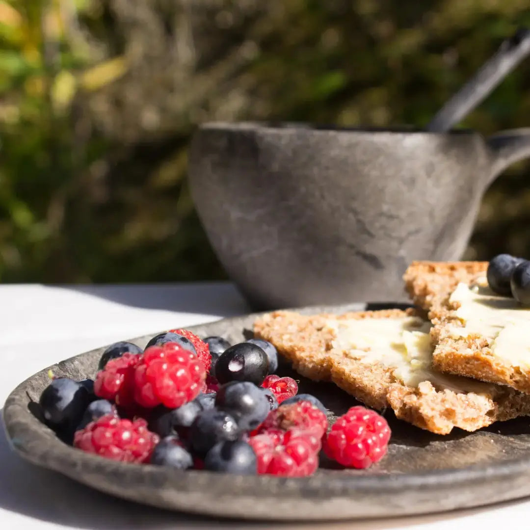 Berries and crackers on a Kupilka Small Plate, perfect for outdoors and hunting adventures