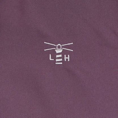 Embroidered lighthouse logo on plum Lighthouse Imogen Ladies Coat fabric for style
