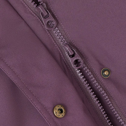 Close-up of Lighthouse Imogen Ladies Coat with purple fabric, two-way zipper, brass snaps