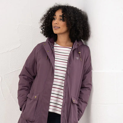 Lighthouse Imogen Ladies Coat in plum with hood, front pockets, over striped shirt