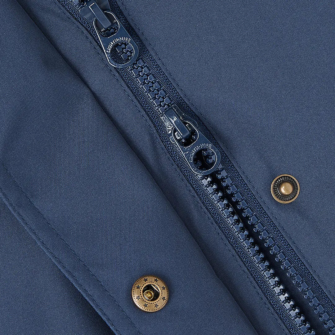 Close-up of blue zipper with brass snaps on Lighthouse Imogen Ladies Coat