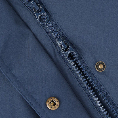 Close-up of blue zipper with brass snaps on Lighthouse Imogen Ladies Coat