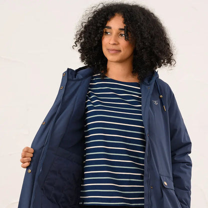 Dark blue Lighthouse Imogen Ladies Coat with gold buttons over striped top