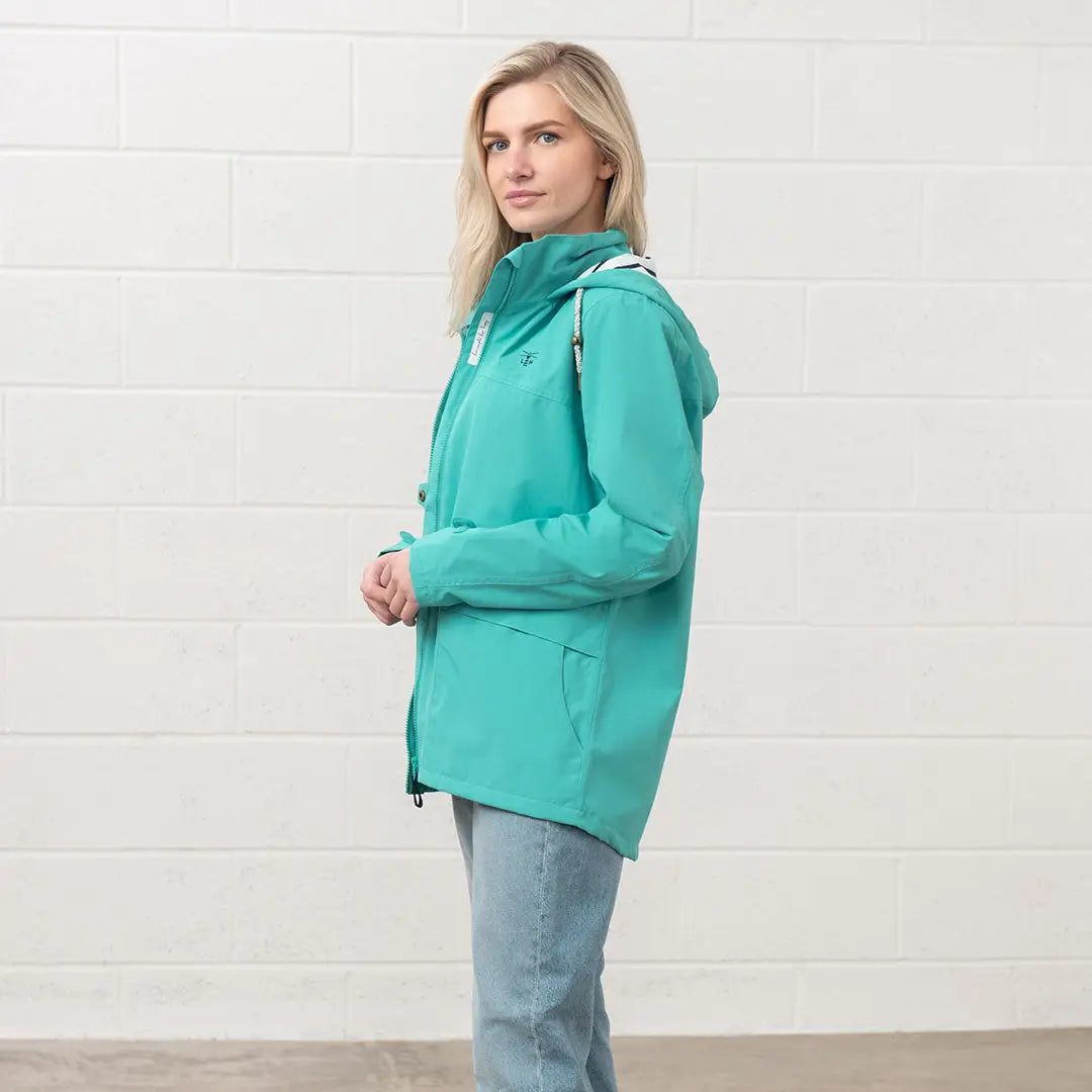 Turquoise Hooded Rain Jacket from the Lighthouse Ladies Beachcomber II Coat collection
