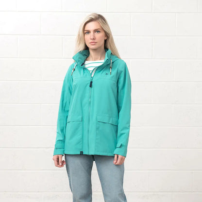 Turquoise hooded raincoat Lighthouse Ladies Beachcomber II Coat for stylish weather protection
