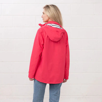 Woman’s pink hooded jacket from the Lighthouse Ladies Beachcomber II Coat collection