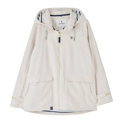 Beige hooded rain jacket from Lighthouse Ladies Beachcomber II Coat collection