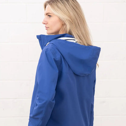 Blue hooded jacket from the Lighthouse Ladies Beachcomber II Coat for stylish beach days