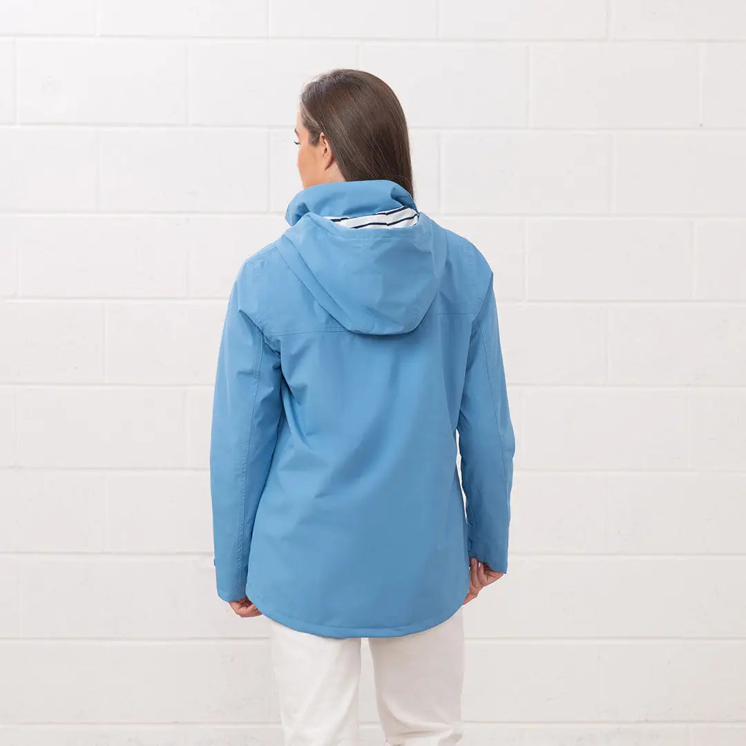 Light blue hooded jacket from the Lighthouse Ladies Beachcomber II Coat collection