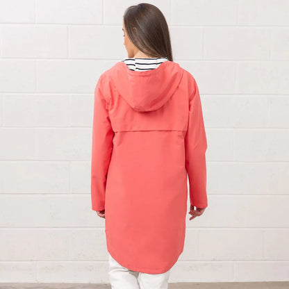 Coral hooded raincoat from Lighthouse Ladies Beachcomber Long II Coat collection