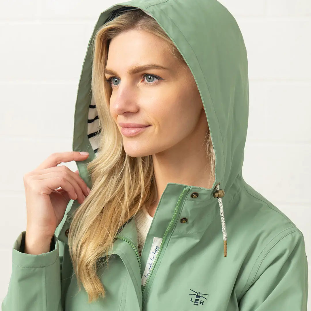 Green Hooded Raincoat from Lighthouse Ladies Beachcomber Long II Coat collection
