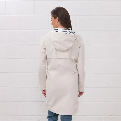 Beige hooded raincoat from Lighthouse Ladies Beachcomber Long II Coat collection