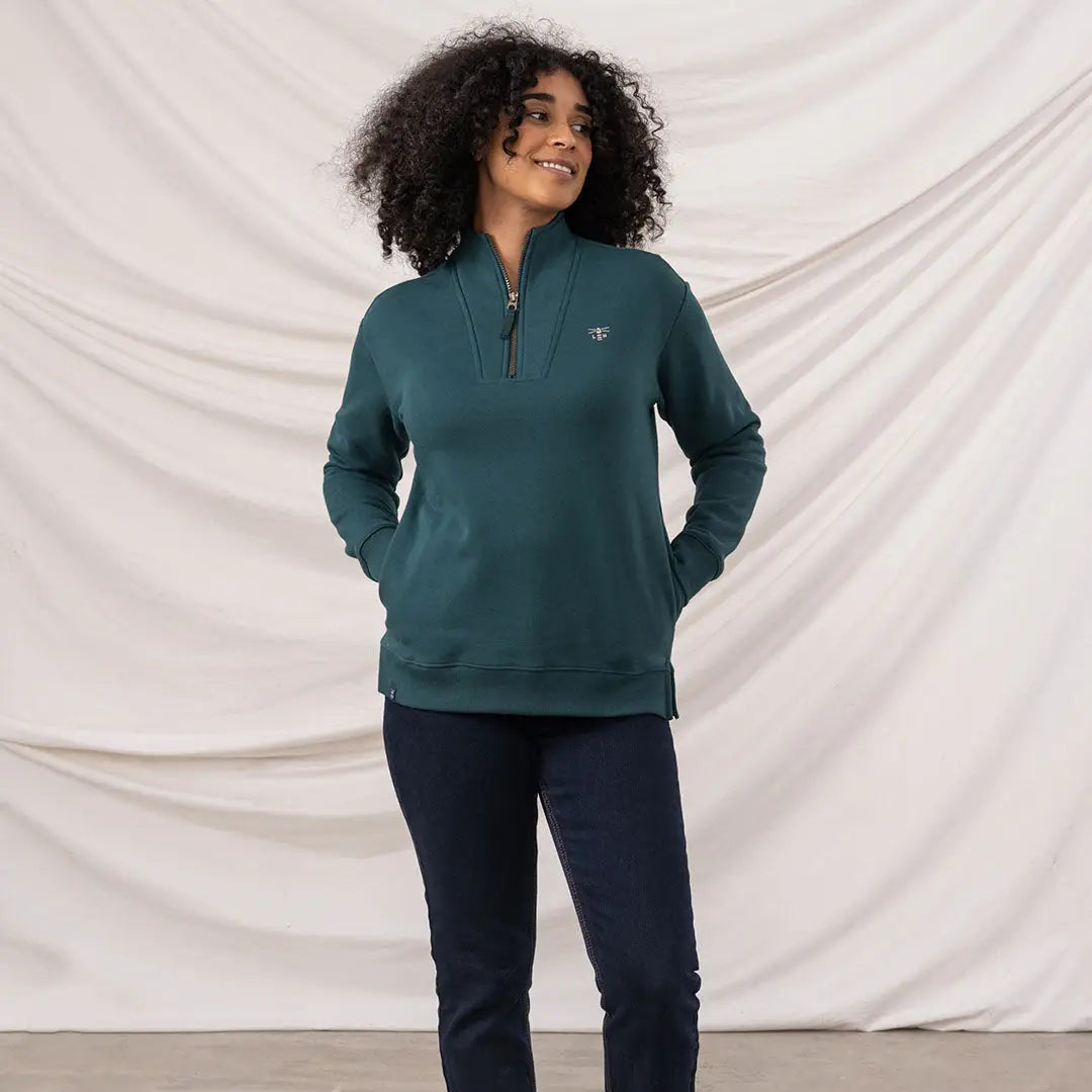 Lighthouse Ladies Coral Jersey sweatshirt with dark teal quarter-zip and embroidered logo