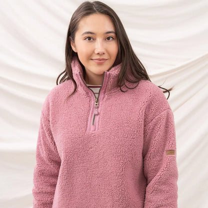 Cozy pink Lighthouse Ladies Coast Fleece half-zip pullover perfect for chilly days