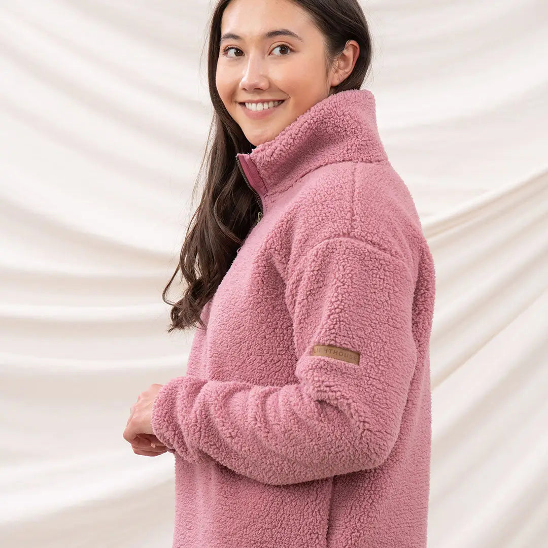 Lighthouse Ladies Coast Fleece half-zip pullover with pink textured fleece and small brown patch