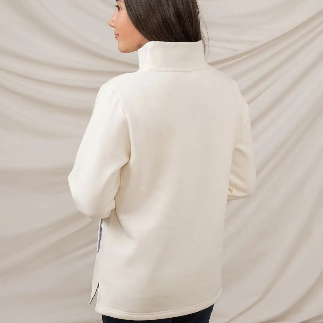 Cream-colored turtleneck sweatshirt from Lighthouse Ladies Haven II Jersey collection