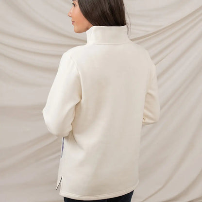 Cream-colored turtleneck sweatshirt from Lighthouse Ladies Haven II Jersey collection