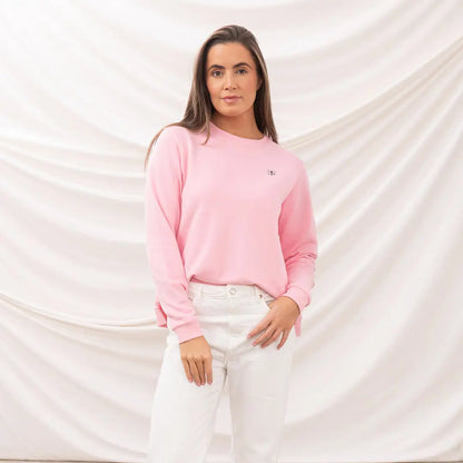 Woman in pink sweatshirt and white pants wearing Lighthouse Ladies Seaside Jersey