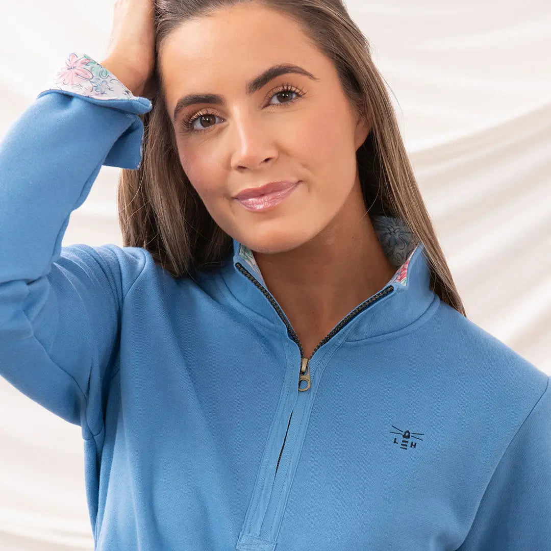 Blue quarter-zip pullover from Lighthouse Ladies Shore II Jersey collection