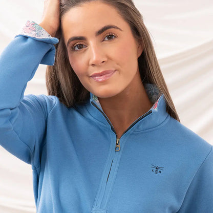 Blue quarter-zip pullover from Lighthouse Ladies Shore II Jersey collection